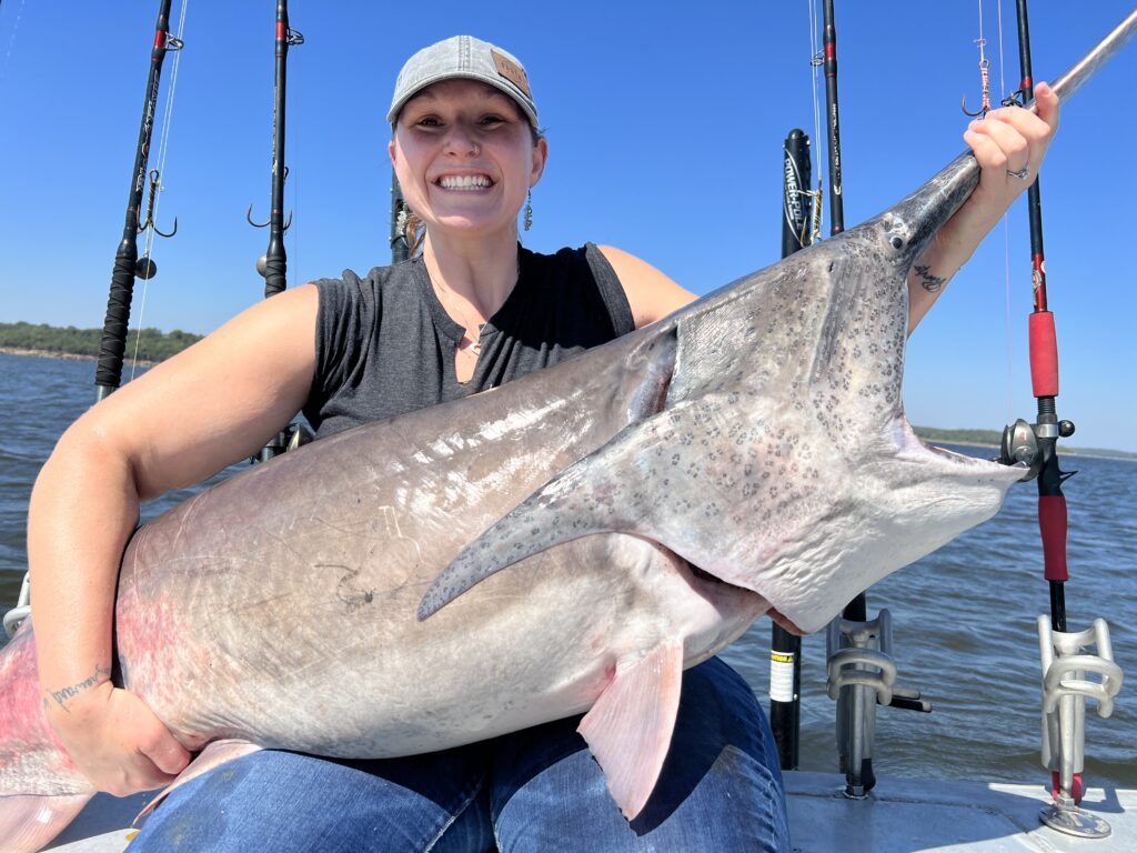 woman holding fish